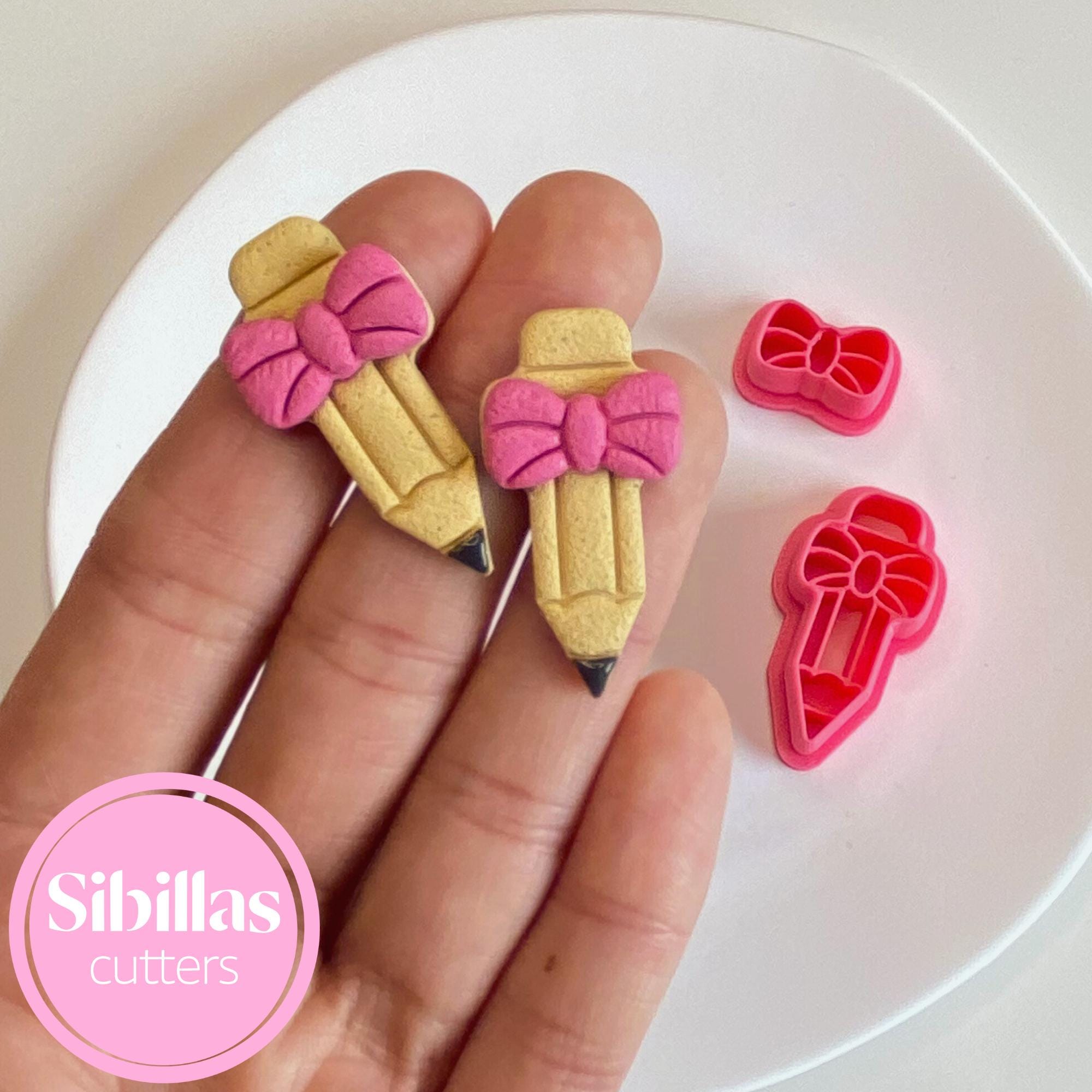 Embossed pencil bow earring cutter for polymer clay making and crafts