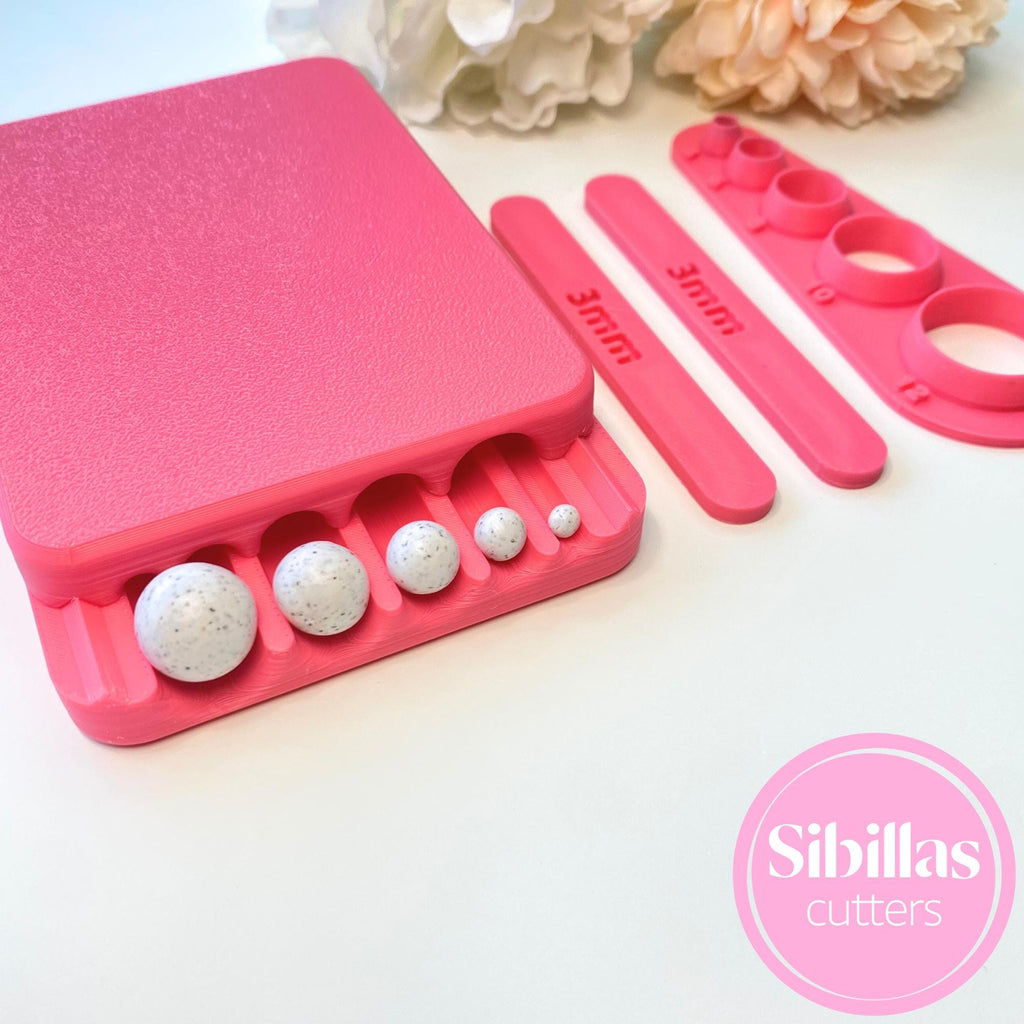 Adjustable polymer clay bead roller creating smooth 4–12mm beads.