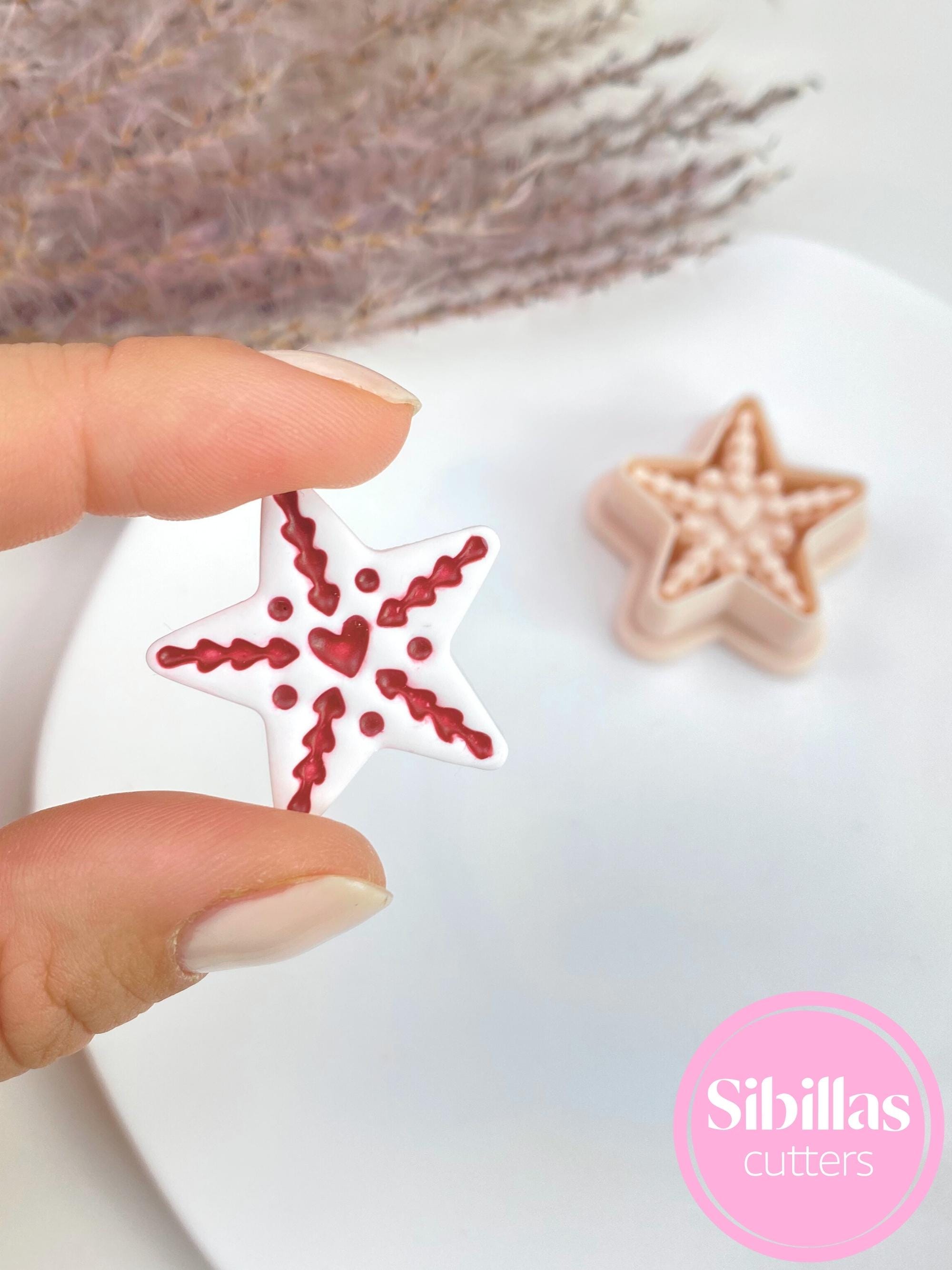 Nordic Star polymer clay cutters in Scandinavian folk art style