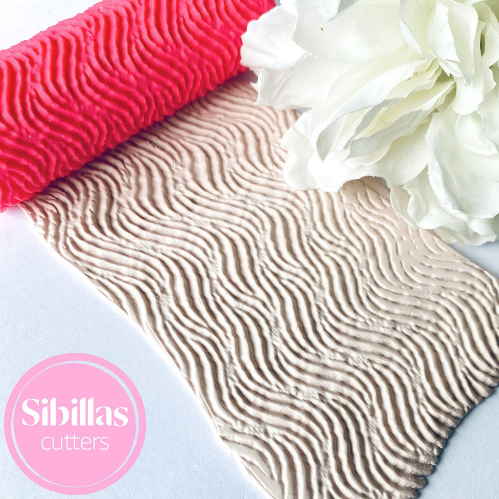 Polymer clay texture roller with abstract line pattern for DIY crafts and jewelry