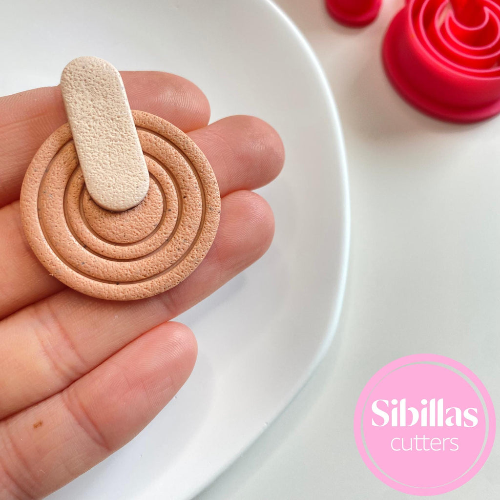 Polymer clay cutter with embossed geometric design for handmade earrings