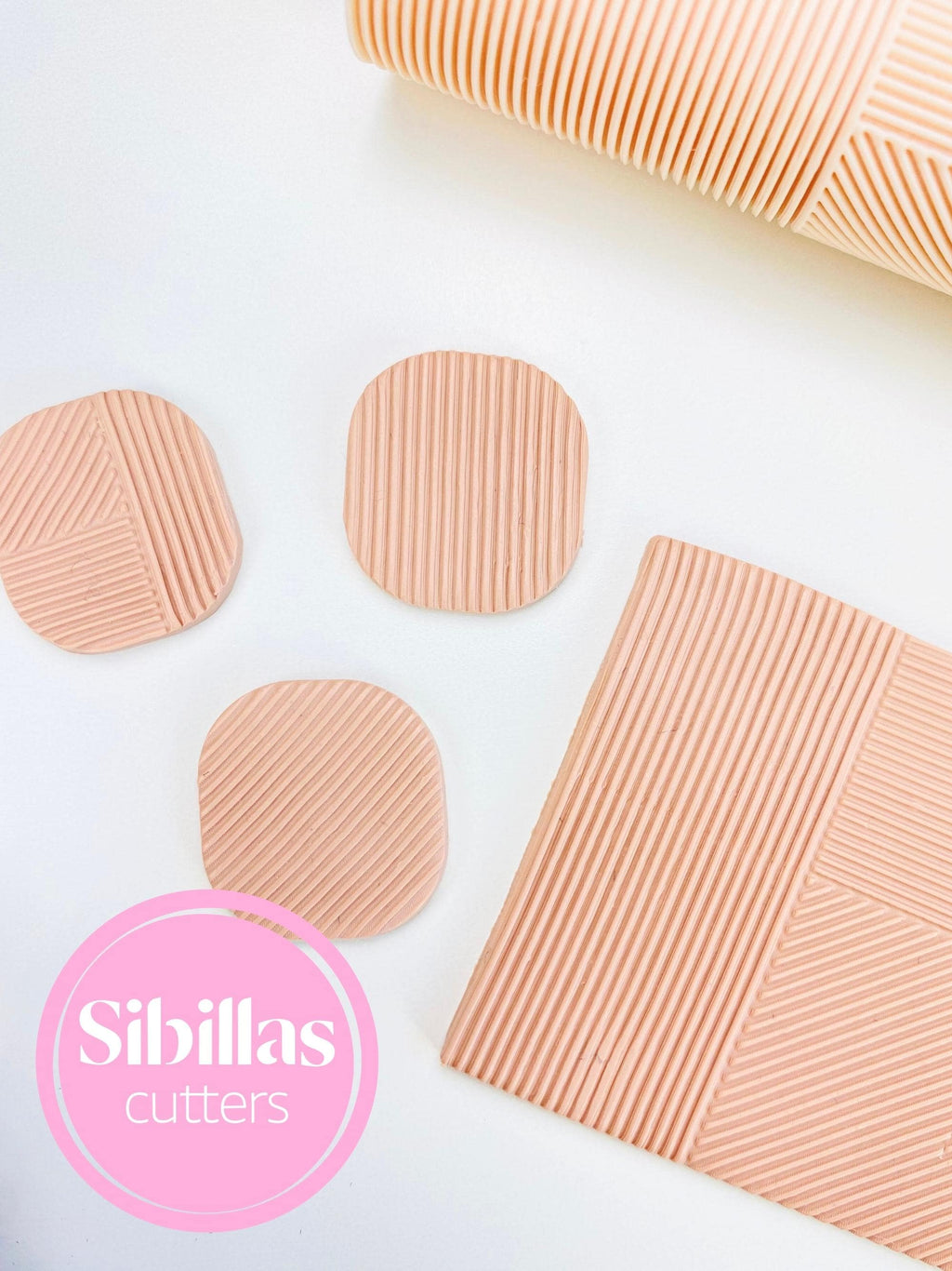 Reusable geometric pattern clay roller for creating embossed polymer clay sheets and designs