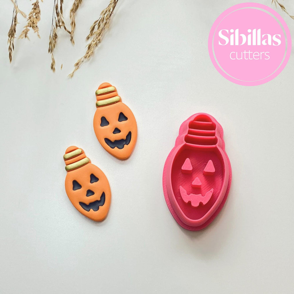 Halloween-themed cookie cutters with jack-o'-lantern design on a light background, branded 'Sibillas'.