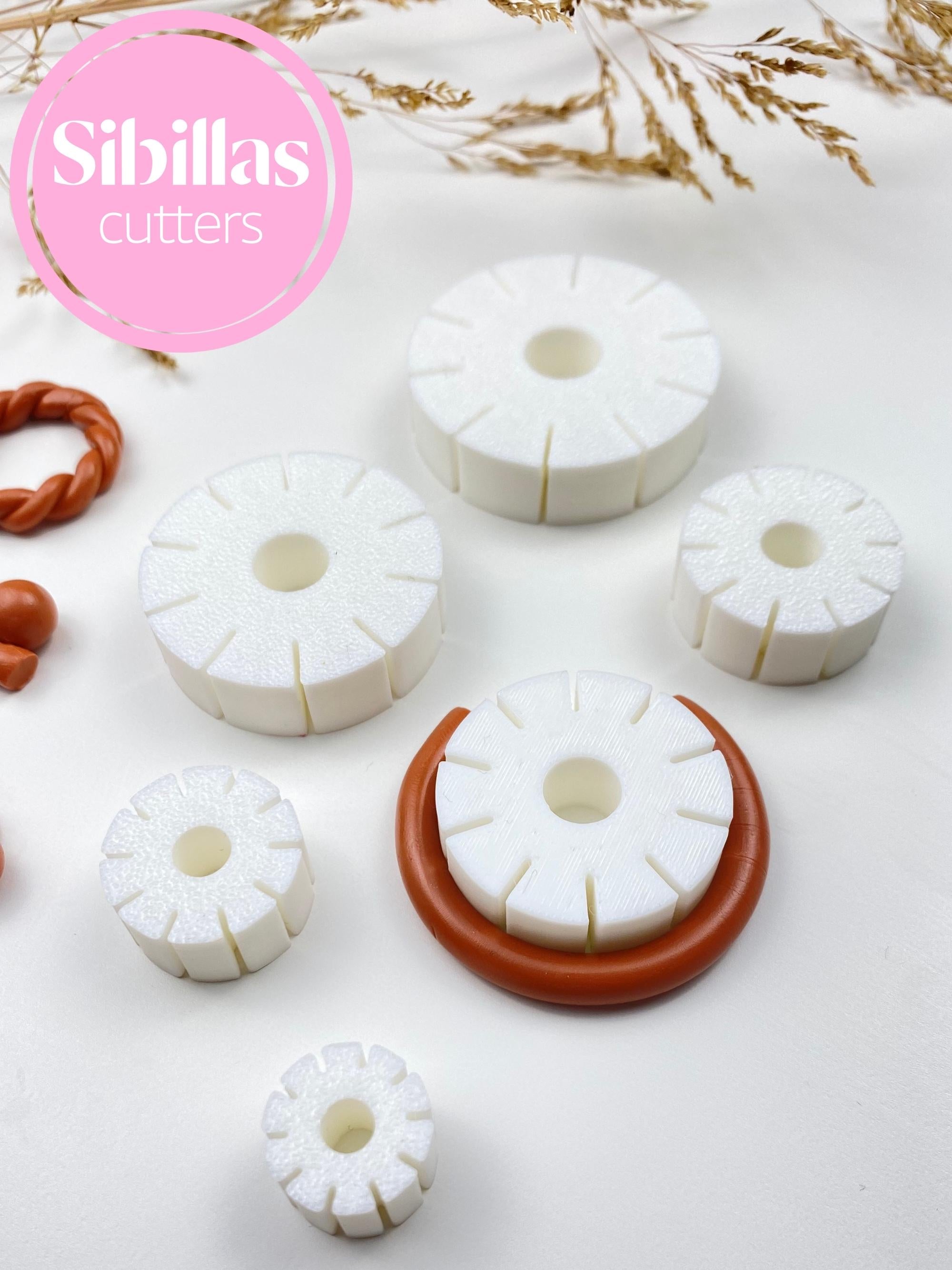 Polymer clay jewelry making supplies: hoop earring guide, cutter, and roller