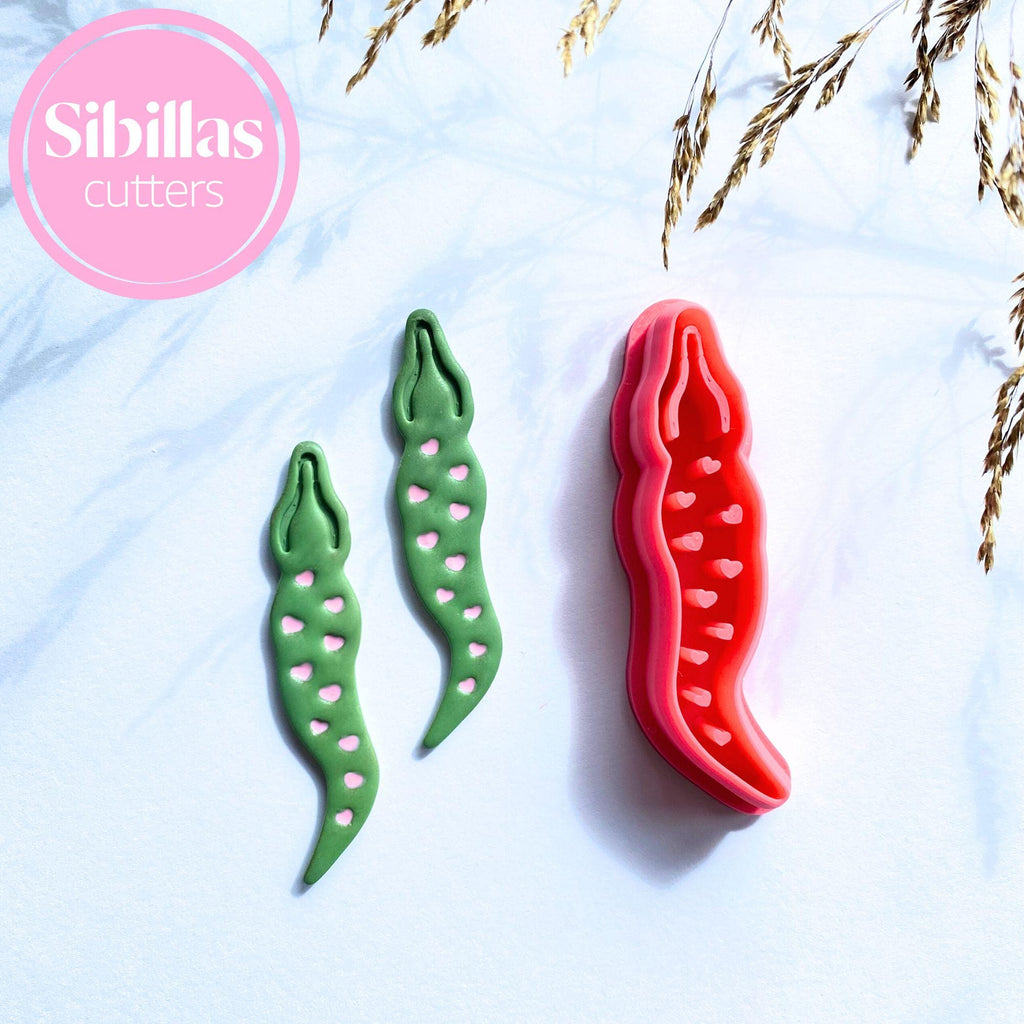 Polymer clay and fondant cutter in alligator design with heart accents for crafting