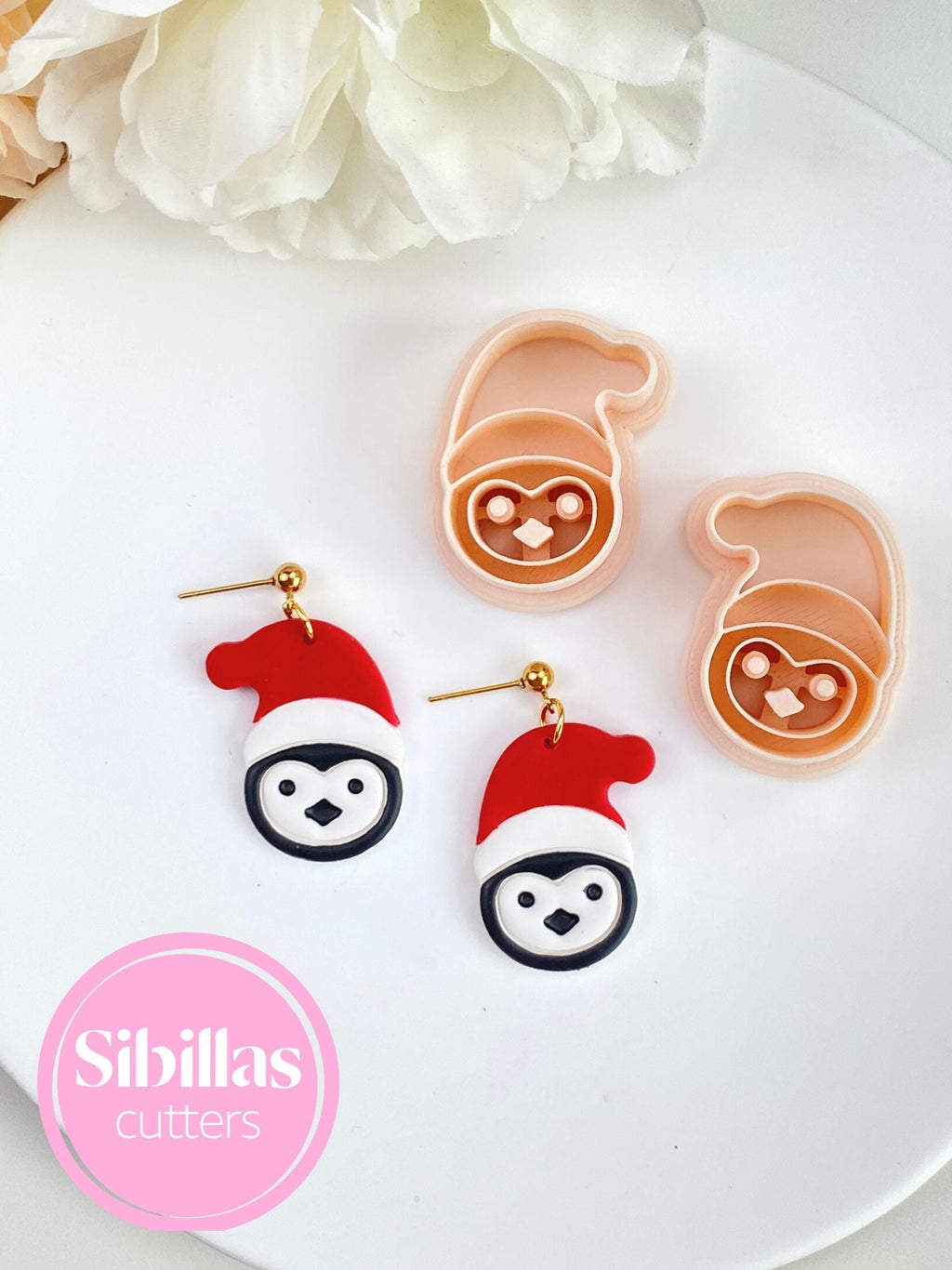 Holiday penguin polymer clay cutter set for making festive earrings and charms