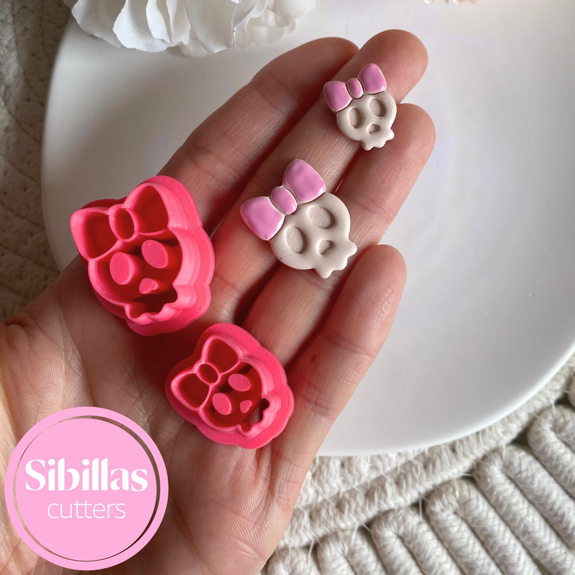 DIY jewelry tool: skull with bow polymer clay cutter for spooky earring projects