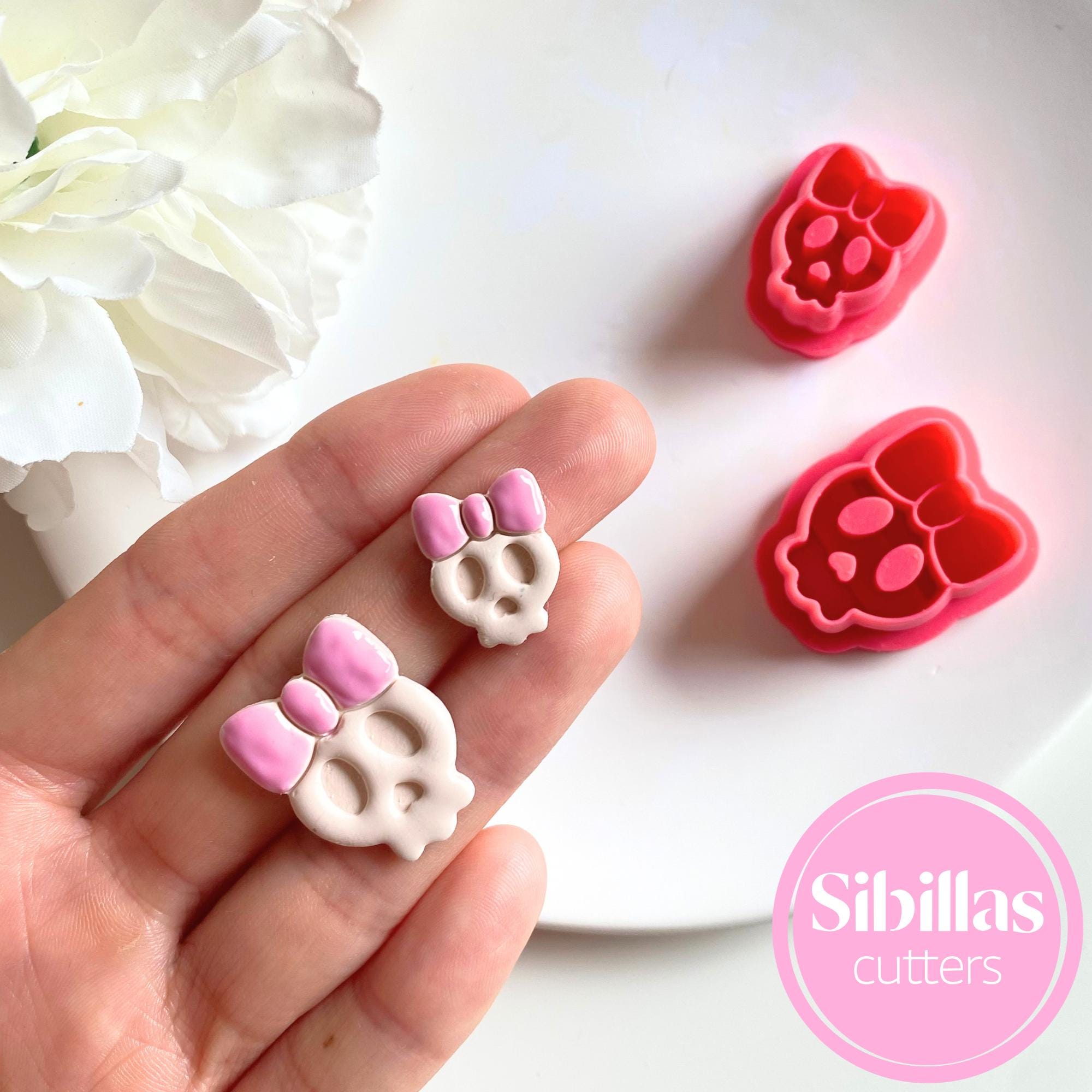 Cute skull-with-bow clay cutter for making polymer clay Halloween earrings