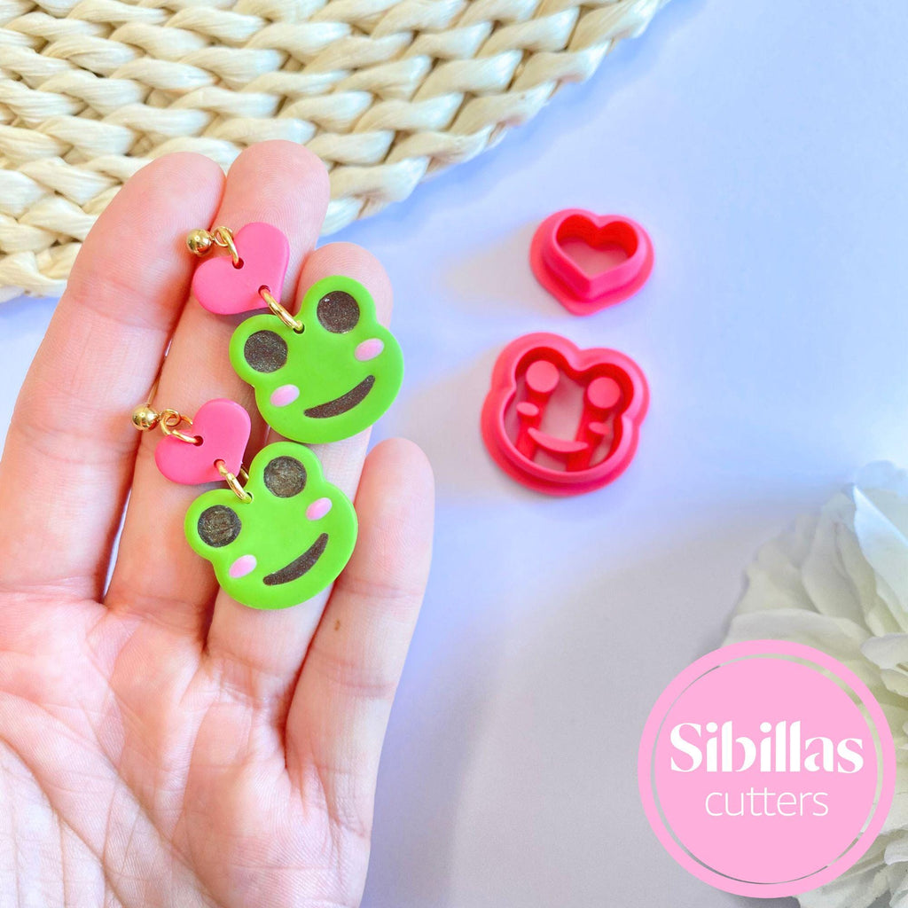 Polymer clay and fondant cutter set featuring frog and heart designs for DIY projects