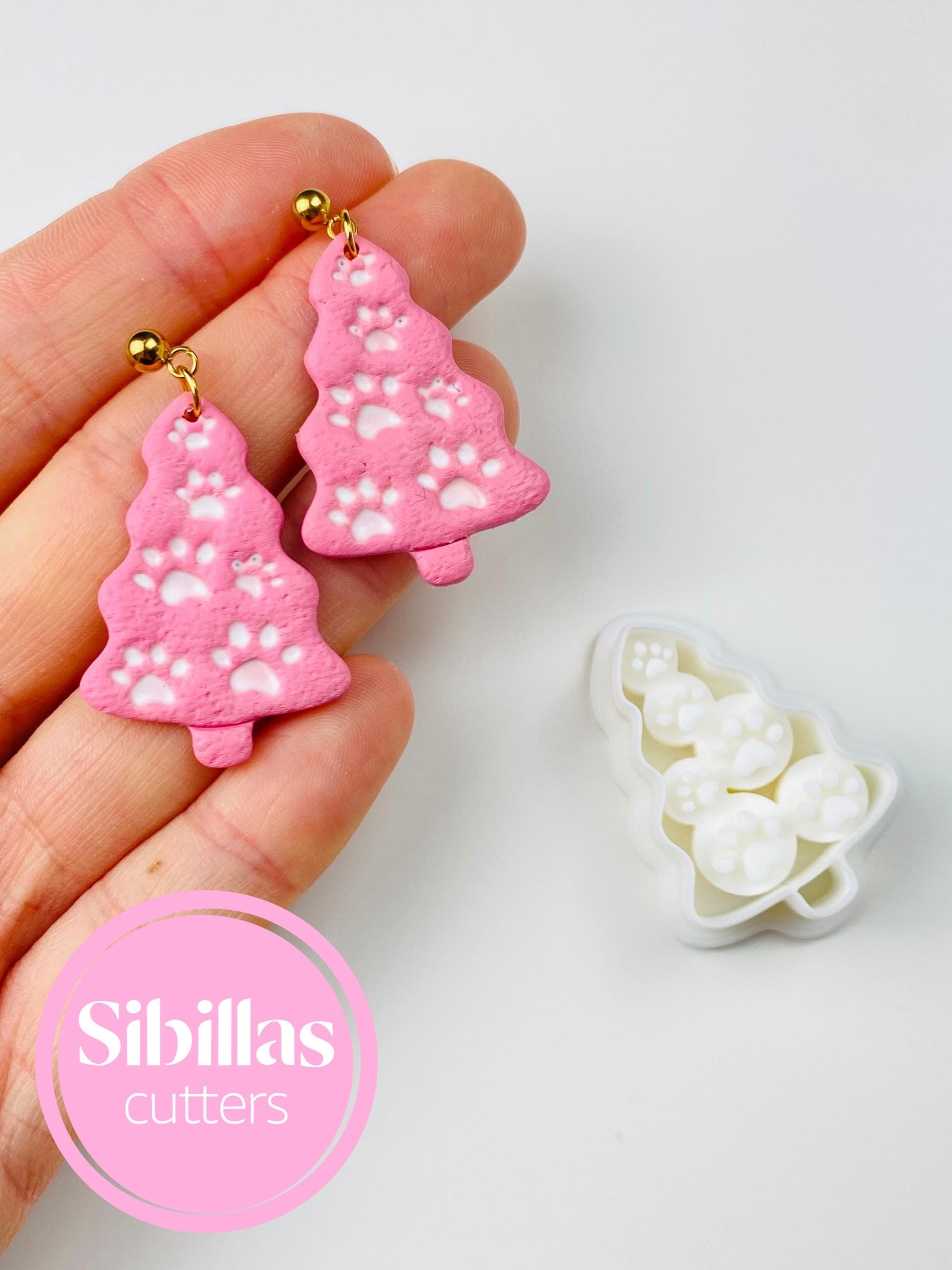 Holiday paw print tree polymer clay cutter for festive pet-themed jewelry