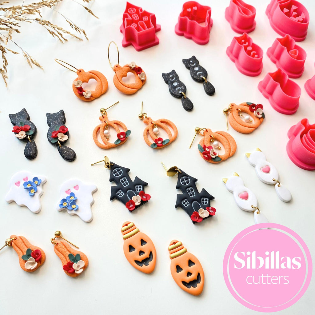 Assorted Halloween-themed cookie cutters and earrings on a white background with 'Sibillas Cutters' branding.