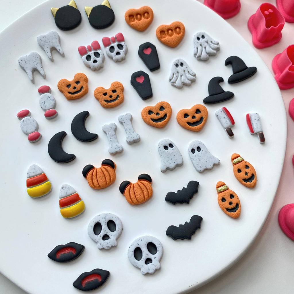 Halloween polymer clay charms made with various themed clay cutters