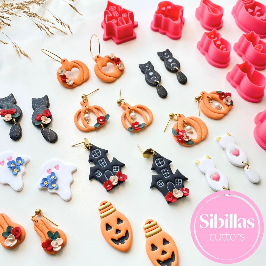 Assorted Halloween-themed cookie cutters and earrings on a white background with 'Sibillas Cutters' branding.