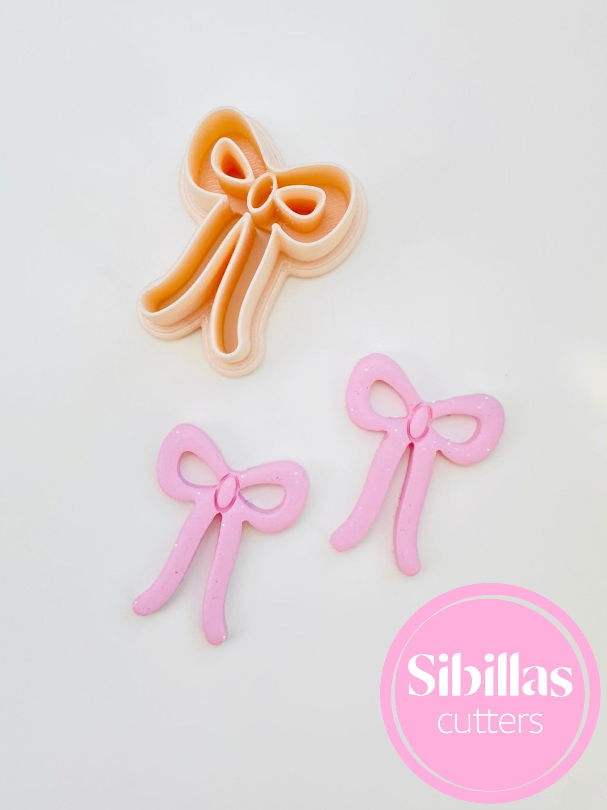 Coquette bow cutter: bow earring clay cutter with sharp tapered edges