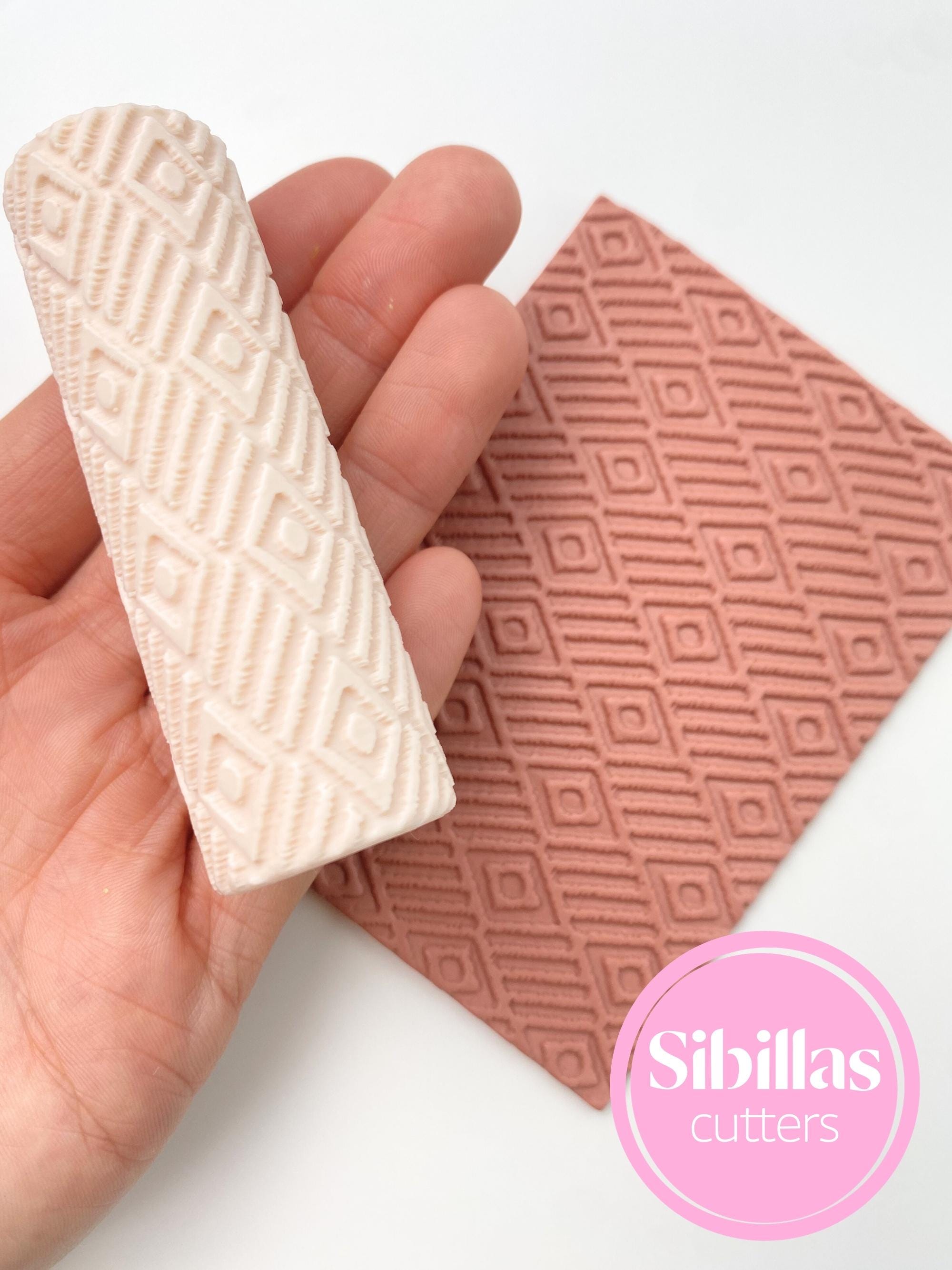 Southwestern clay roller: Geometric polymer clay embossing stamps