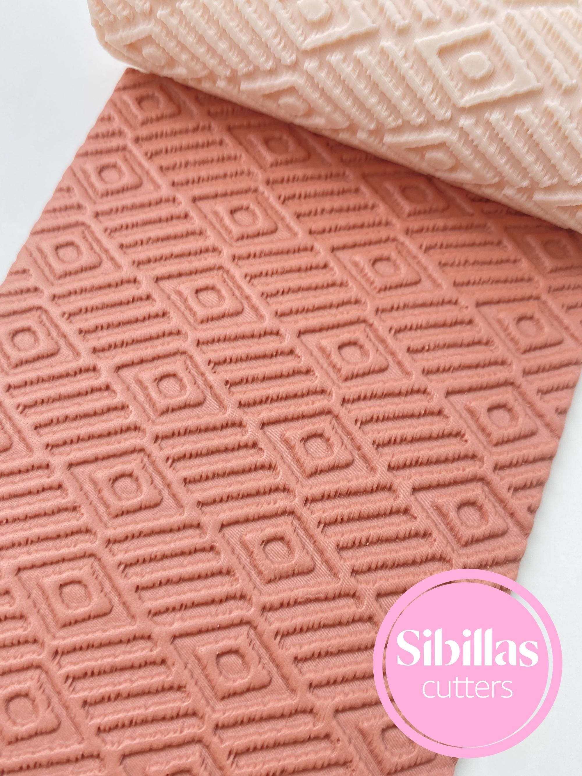 Southwestern clay roller: Geometric polymer clay embossing stamps