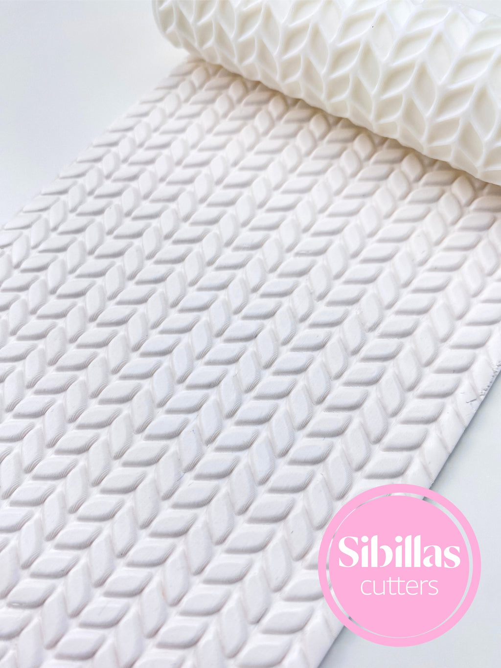 Knitted clay pottery roller featuring a detailed sweater-style pattern, paired with sweater pottery stamps, a knit ceramic hands texture roller, and a tissue rolling pin. These tools are designed for adding cozy, fabric-like designs to polymer clay, pottery, and ceramic projects. Perfect for crafting boho earrings, jewelry pieces, trinket trays, ornaments, and textured clay slabs. The knit patterns create a warm, handmade look, while the tissue roller gives a soft, delicate surface texture.