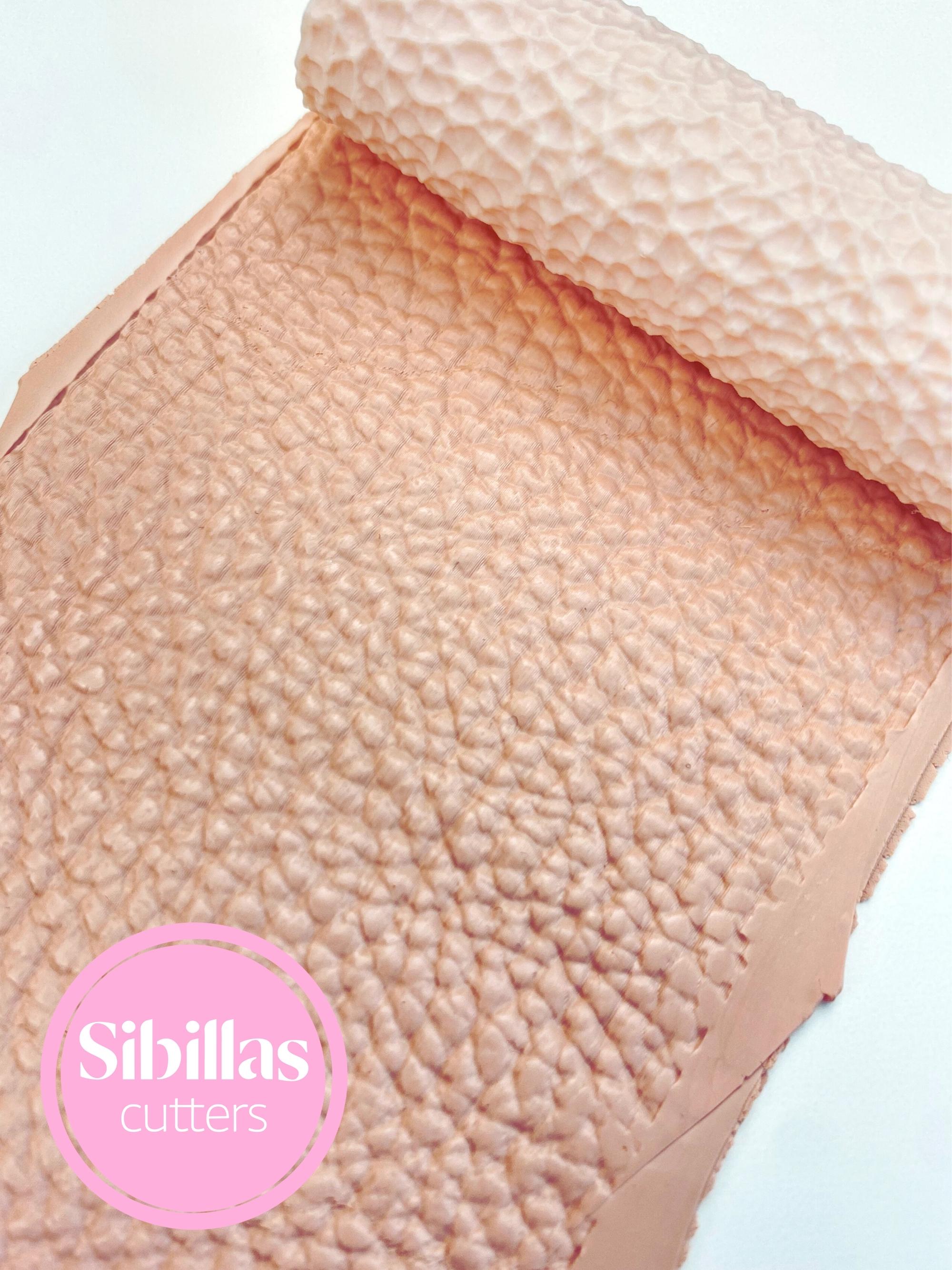 Natural leather clay embossing roller for DIY polymer clay and crafting projects