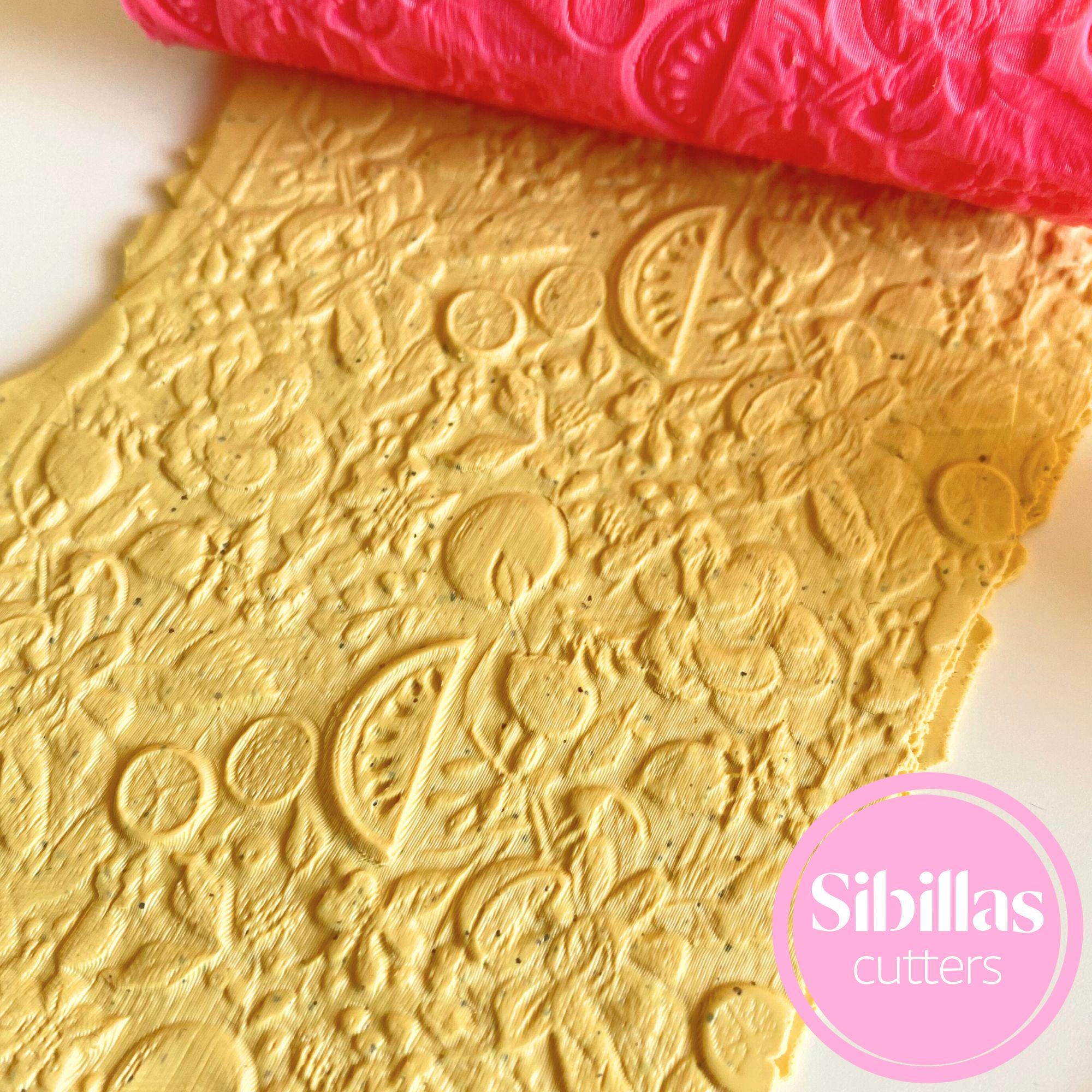 Embossed clay roller with fruit and flower pattern for earrings and DIY projects