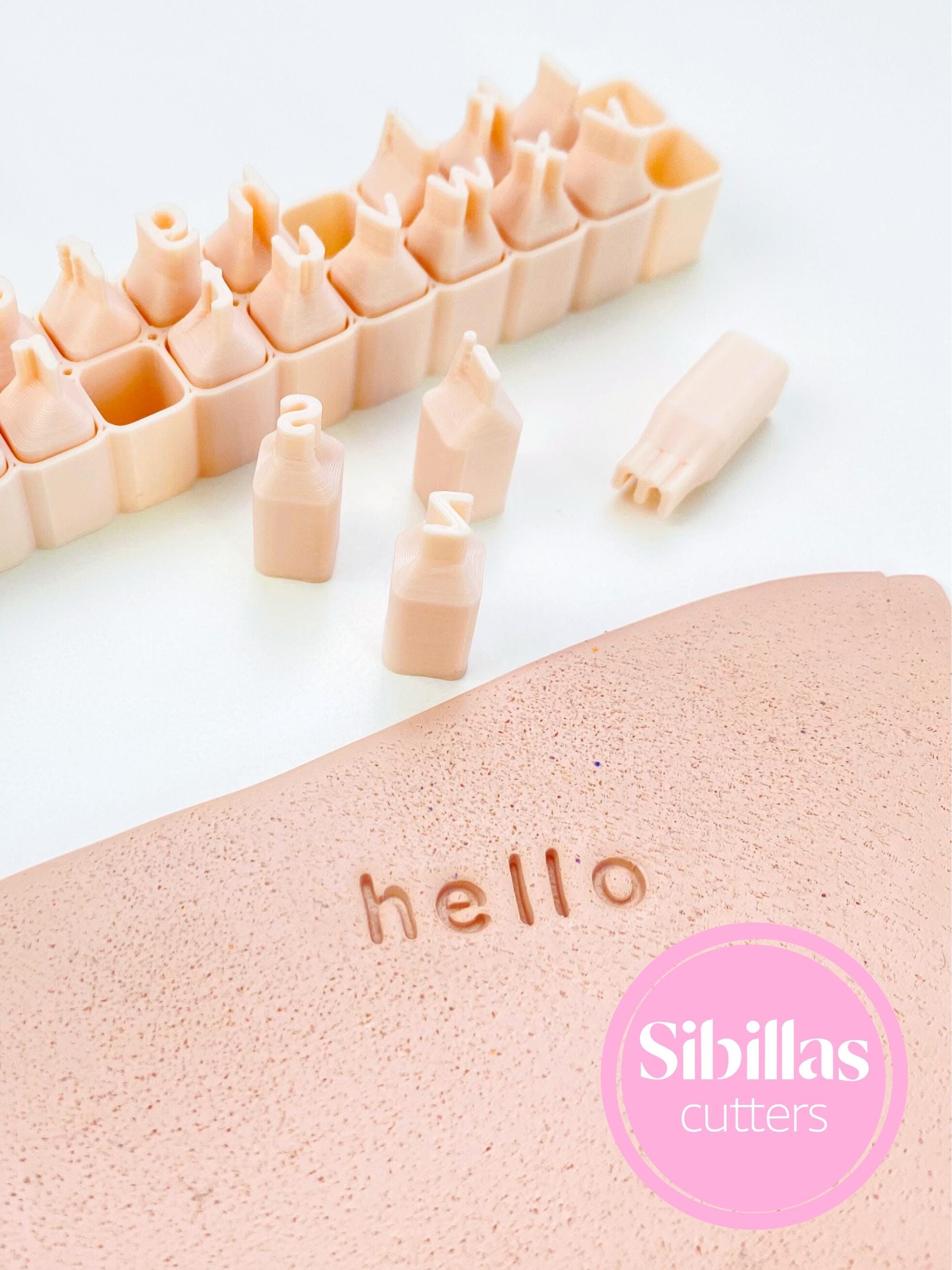 Alphabet imprint tool with lowercase stamps for clay, pottery, and ceramics
