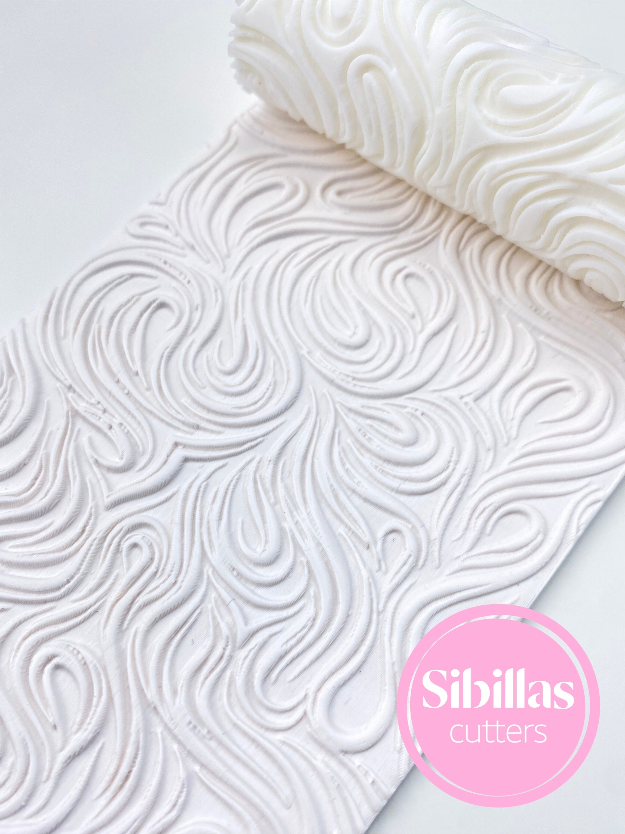 Textured rollers for clay featuring elegant waves and abstract line patterns, designed for polymer clay DIY crafts. This vintage ceramic hand roller creates beautiful textures for earrings, charms, and small pottery pieces. Perfect for adding unique patterns to polymer clay jewelry, pendants, and Boho-inspired designs. Lightweight, easy to use, and ideal for hobbyists, small business Etsy sellers, and professional crafters looking to create detailed, handmade clay textures.