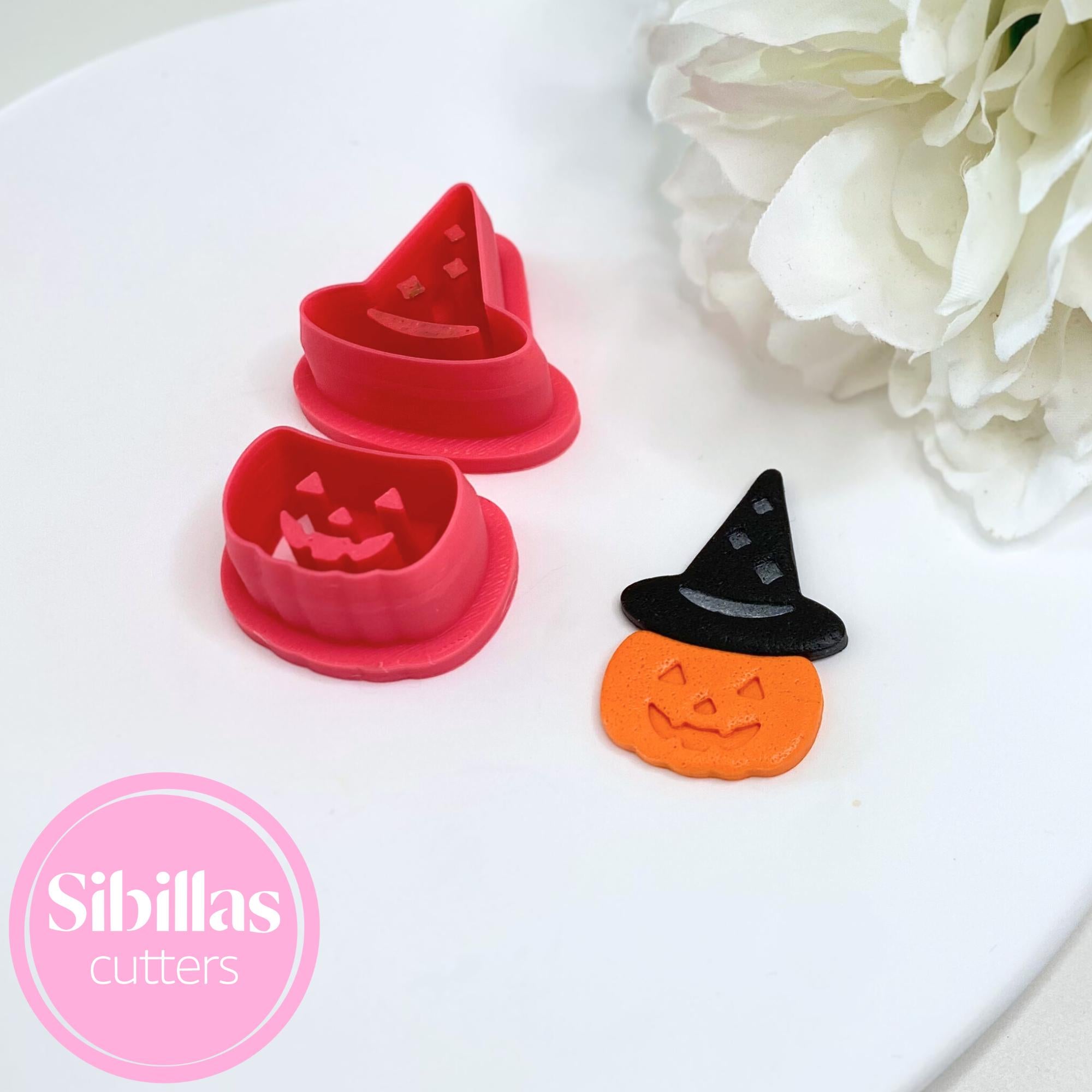Polymer clay cutter shaped like a pumpkin wearing a magic hat for festive crafts