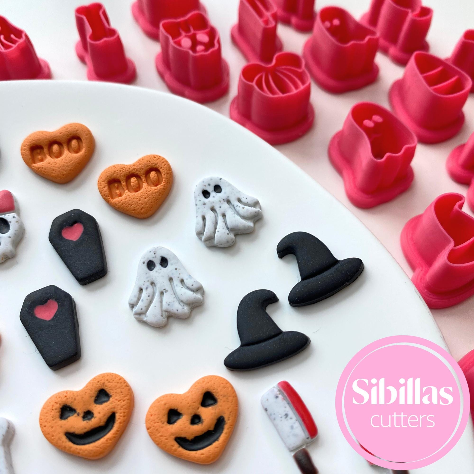 small handmade polymer clay pieces created using Halloween clay cutters
