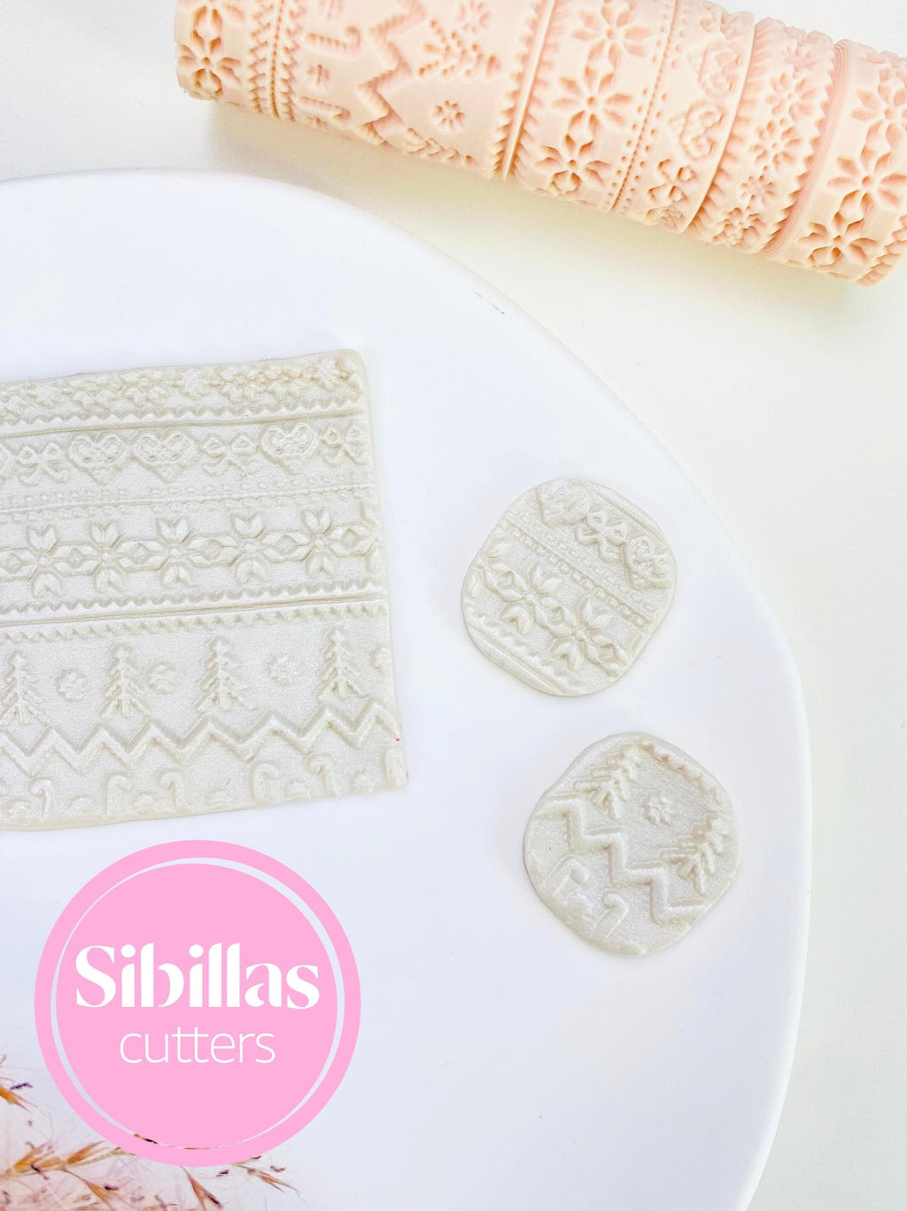 Clay texture tool featuring folk Christmas design for polymer clay crafts and decorations