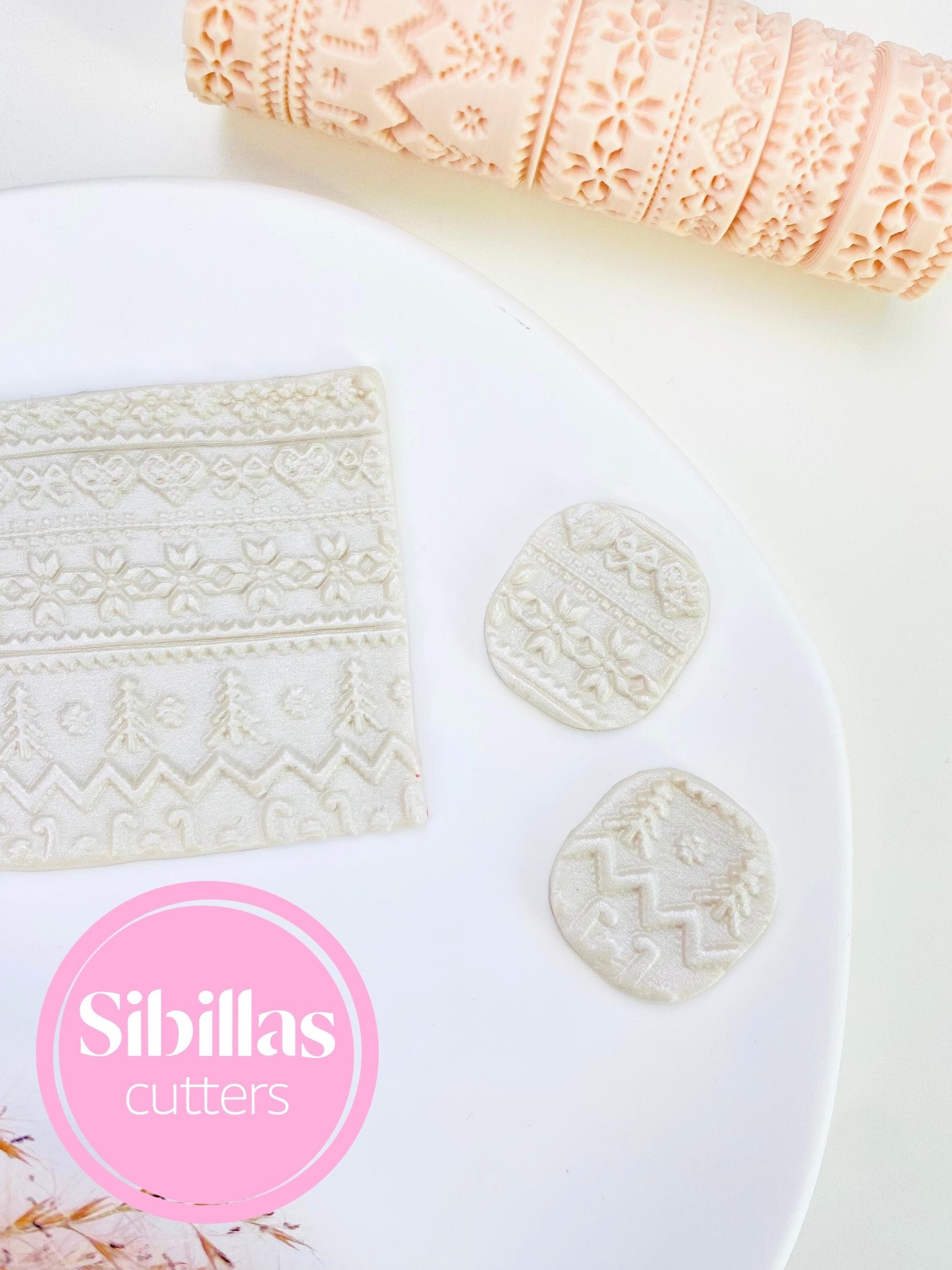 Clay texture tool featuring folk Christmas design for polymer clay crafts and decorations