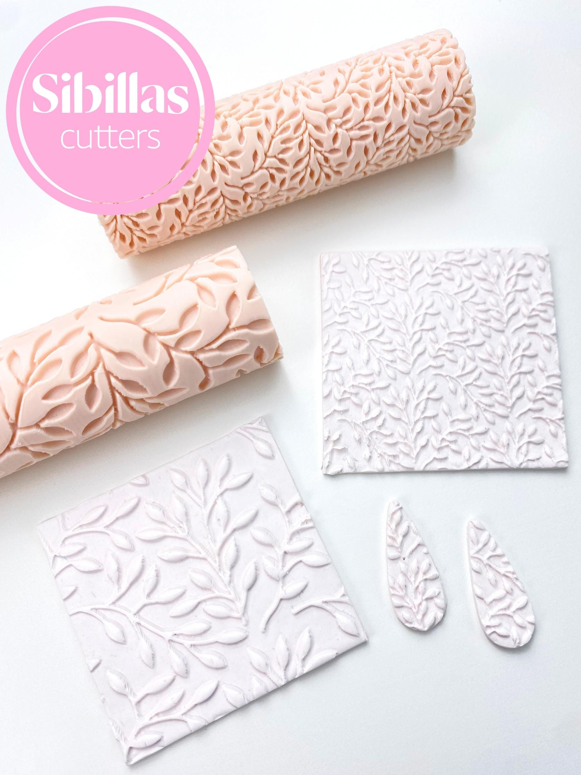 Polymer clay texture tool featuring olive leaves design for jewelry and crafts