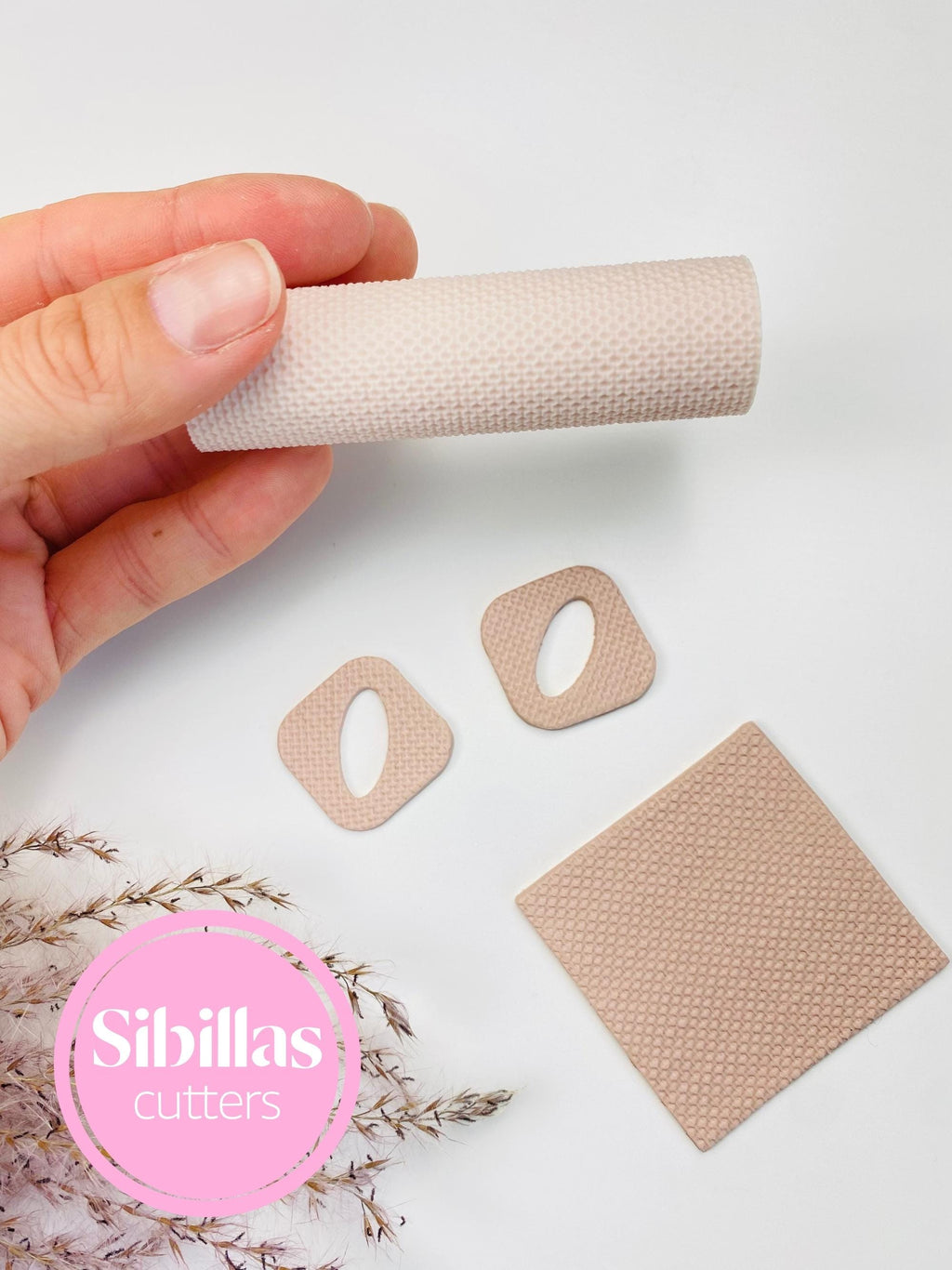Reusable linen texture roller for creating polymer clay sheets, jewelry, and decorative crafts"