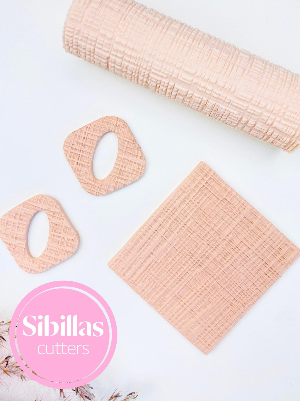 Reusable gauze fabric clay roller for creating embossed polymer clay sheets and designs