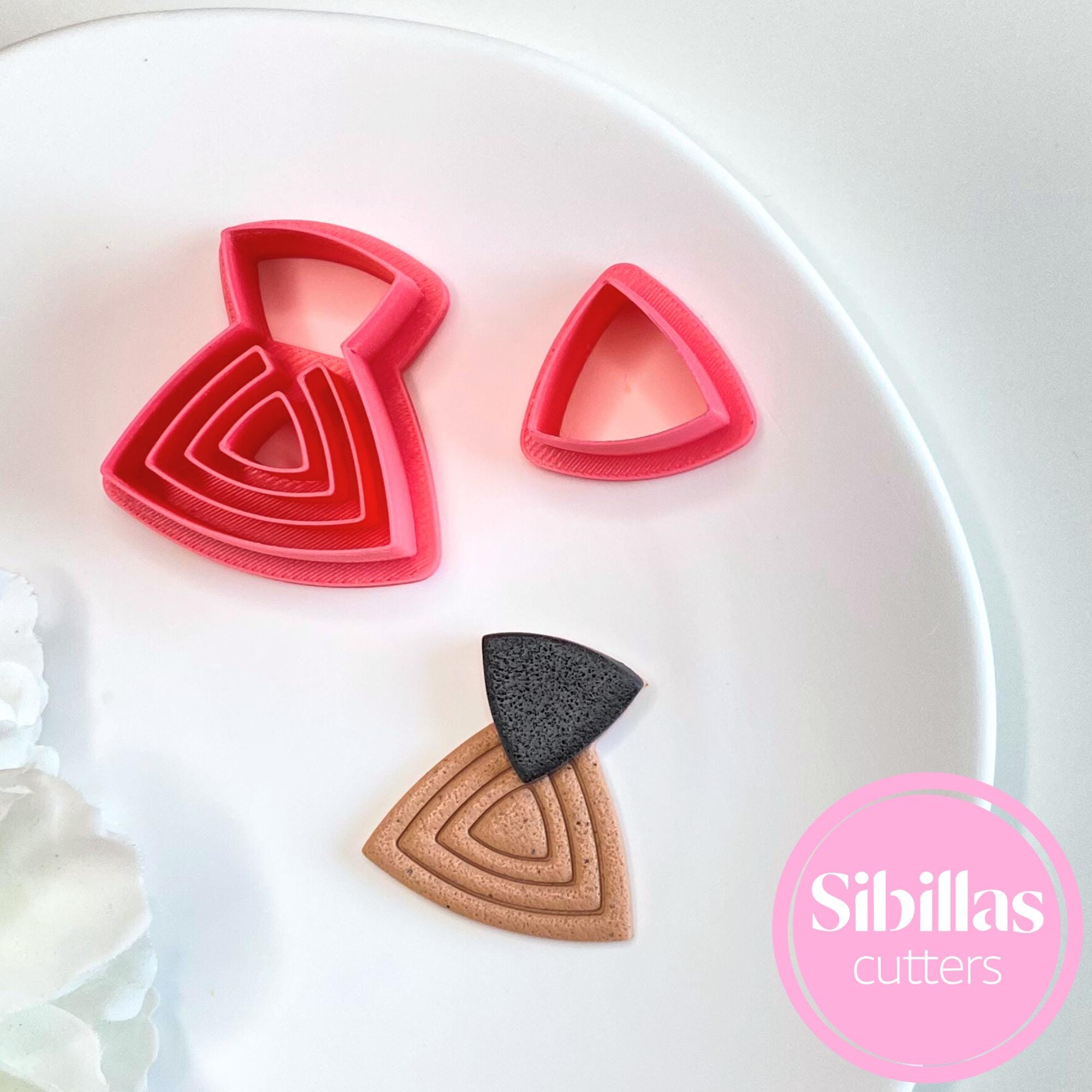 Embossed triangle polymer clay cutter for earrings, charms, and DIY jewelry