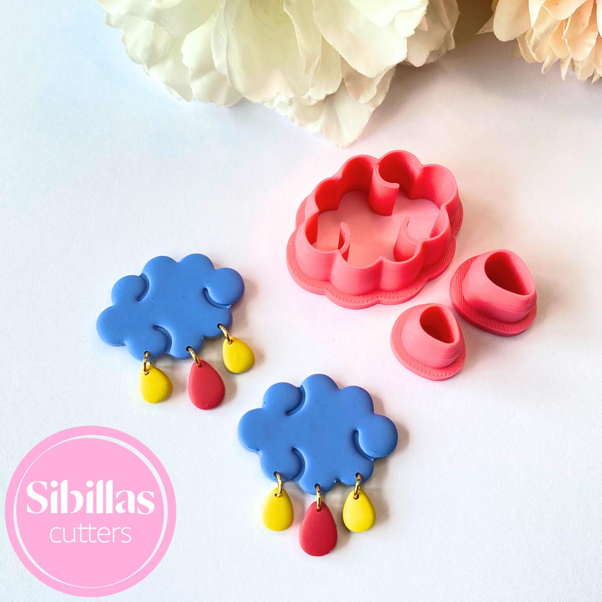 Polymer clay cutter set featuring adorable cloud shapes for crafting and jewelry making