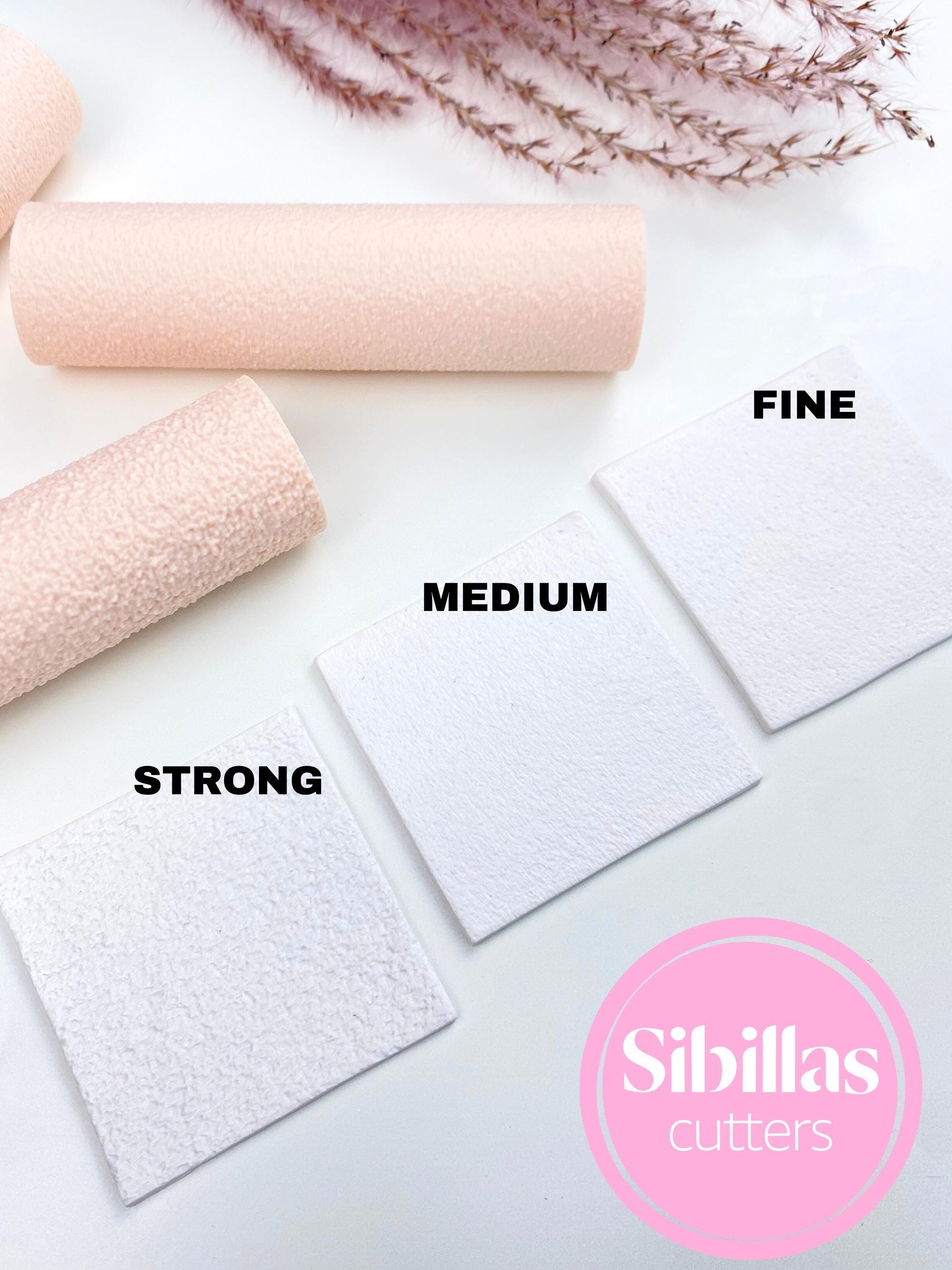 Polymer clay embossing roller with sandpaper-style texture for DIY crafts