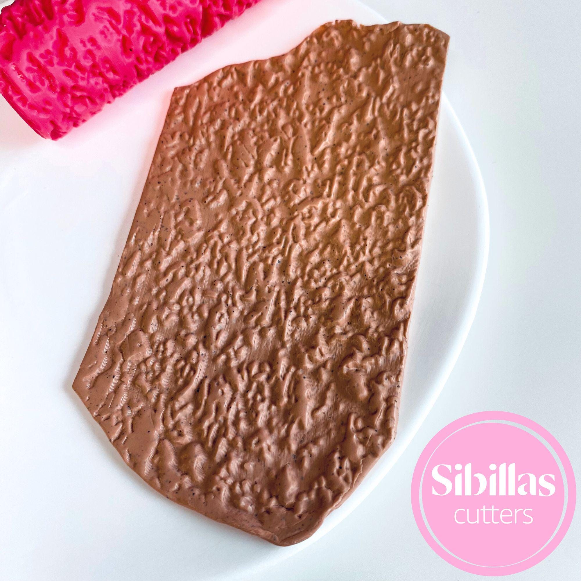 Reusable stone pattern clay roller for creating textured polymer clay and craft designs