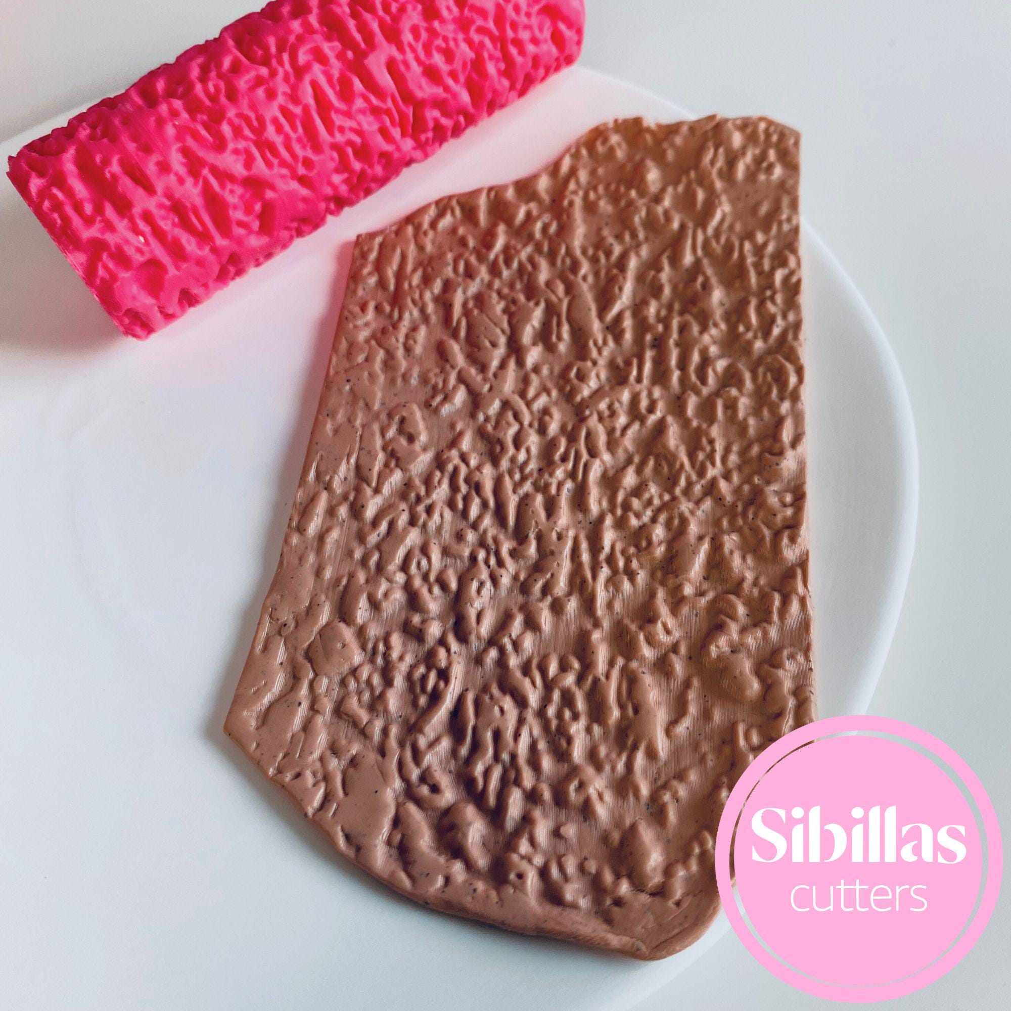 Clay texture tool featuring stone design for polymer clay sheets and jewelry making