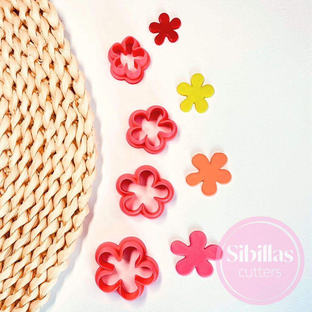 Polymer clay cutter with abstract flower shape for boho-style jewelry making