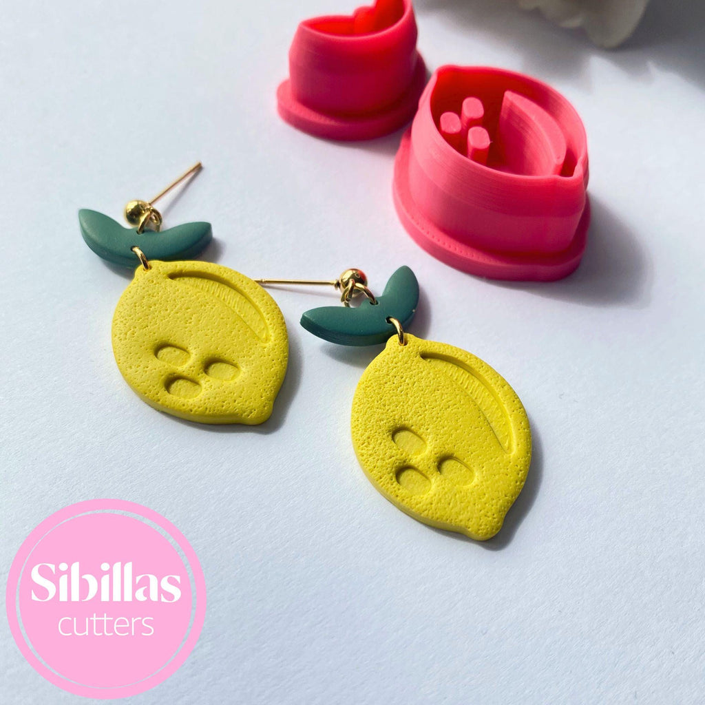 Polymer clay cutter set featuring lemon dangle shapes for earrings and charms