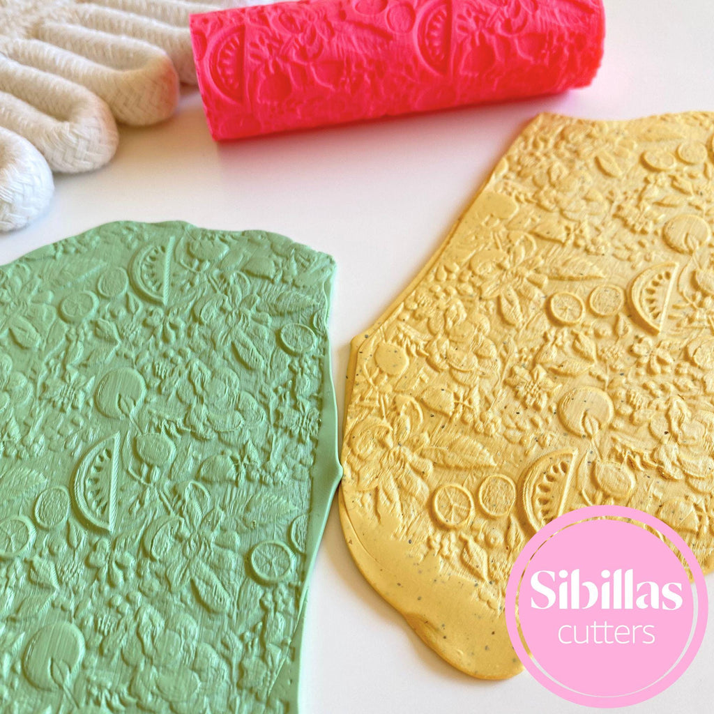 Polymer clay texture roller featuring summer fruit and floral design