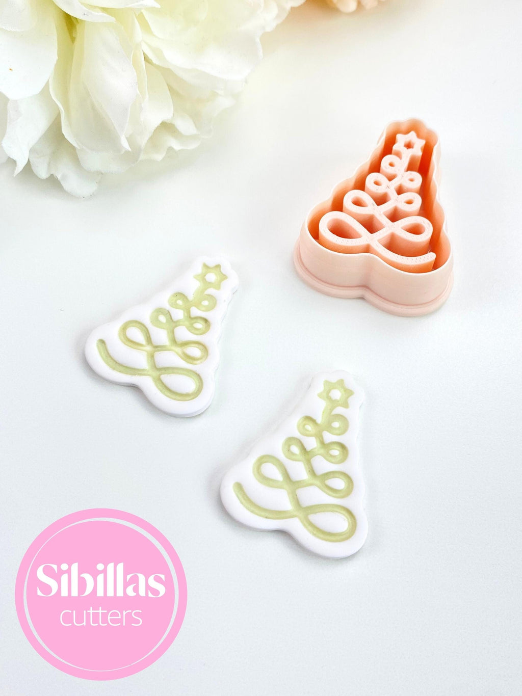 Swirl Christmas tree polymer clay cutter for holiday earrings and DIY crafts