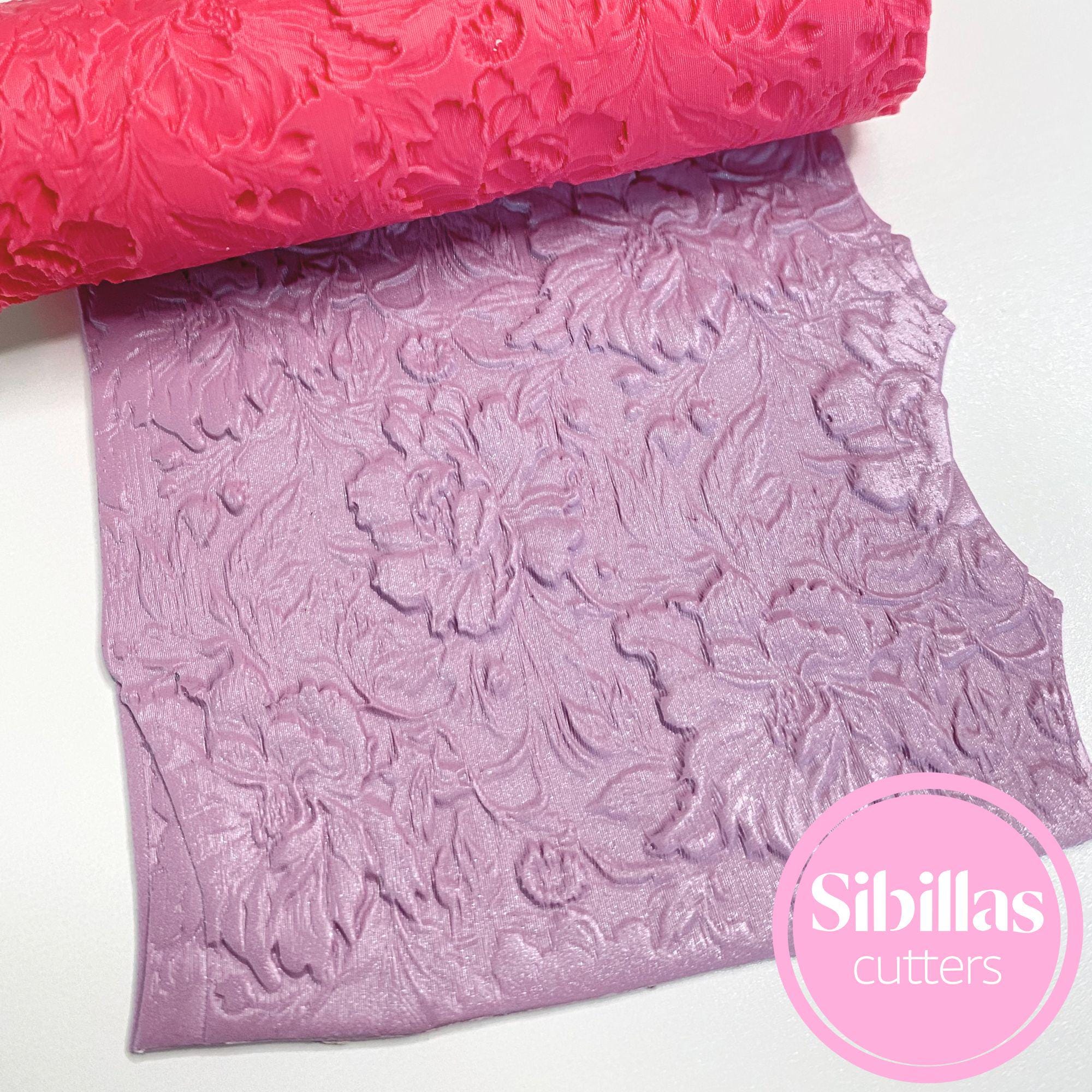 Peony floral embossed clay roller for creating detailed polymer clay designs