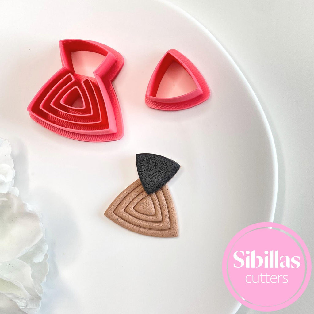 Polymer clay cutter featuring embossed triangle pattern for handmade earrings