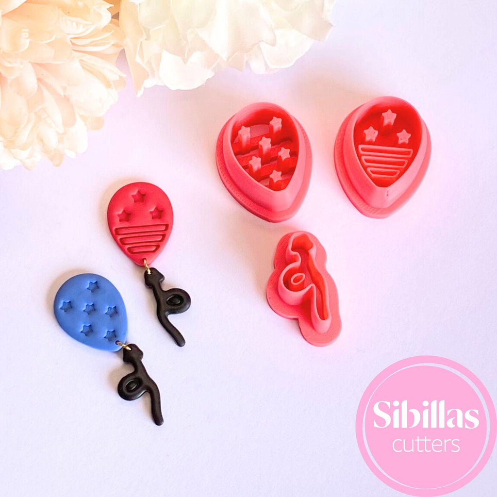 Red, white, and blue balloon-shaped clay cutters for handmade earrings and decorations