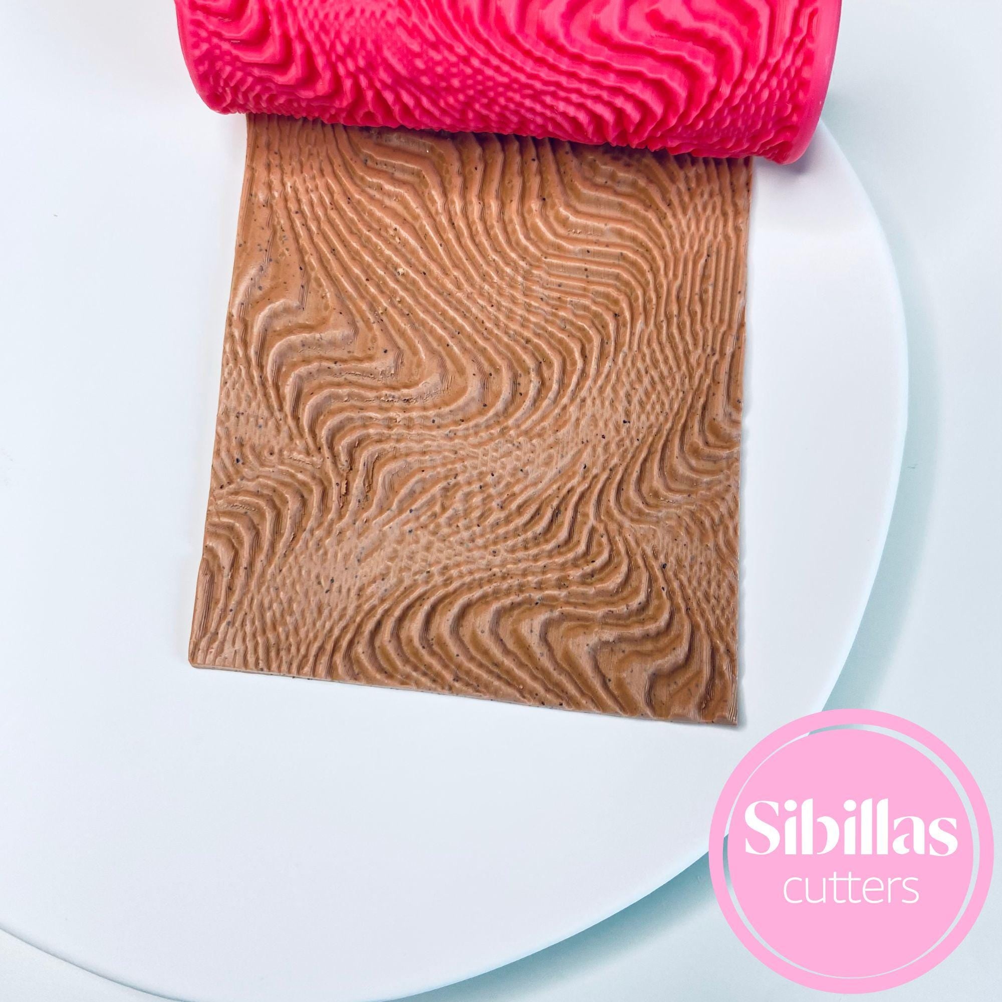 Clay texture tool with abstract lines design for handmade polymer clay sheets and charms