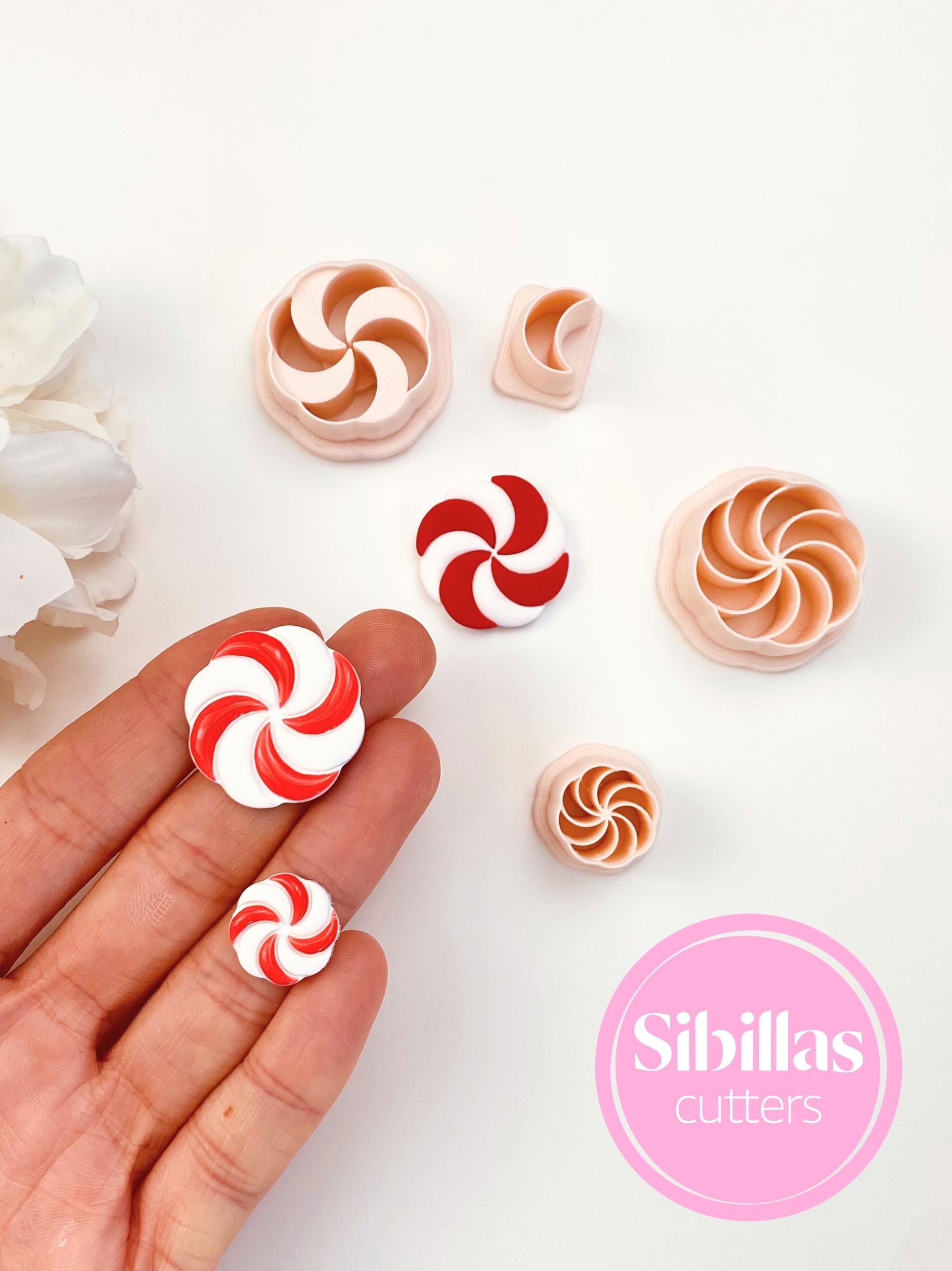 Polymer clay cutter featuring Christmas candy design for festive jewelry projects